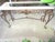 This is a GORGEOUS! Vintage French Ornate Iron with Marble and Glass Top Console Table with a Bronze Finish with Extra...