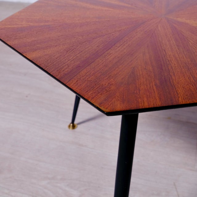 Beautiful hexagonal coffee table with a wooden top and metal frame, brass feet. 1950s design Dimensions: 57x50 cm Height:...