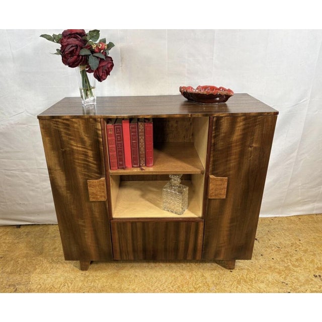 A charming and beautifully crafted art deco cabinet dating from the 1930s–1940s, offering classic period styling in a...
