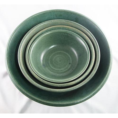 Bring practicality and beauty to your kitchen with this set of earthenware mixing bowls. Signed by two artists, these...