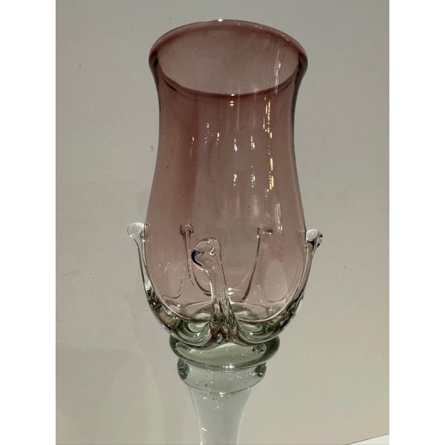 Hand-blown studio art glass wine goblet by John Deeble, signed “Deeble” on the underside of the bowl. The form features a...