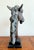 This bronze horse head sculpture features a strong, elongated form with expressive detailing in the mane and muzzle. The...