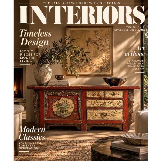 A richly weathered Tibetan cabinet console featuring hand-painted floral and figurative panels in subdued cinnabar red,...