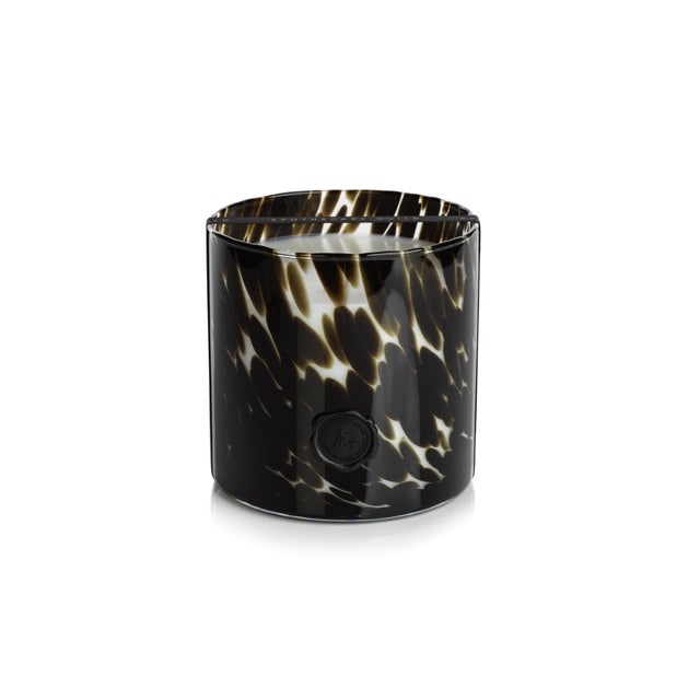Infuse a luxury fine fragrance and light into your home with this lovely candle. Its elegant glass jar design with seal...