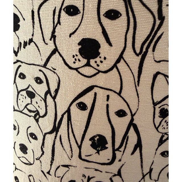 Decorative drum lampshade crafted from a graphic black-and-ivory illustrated textile featuring an expressive assortment of...