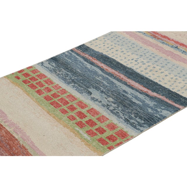 Made with hand-knotted wool, this 3x6 contemporary runner rug is a vibrant new addition to Rug & Kilim’s Homage rug...