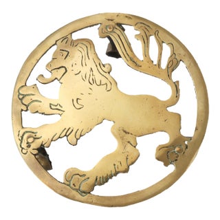 Antique English Brass Lion Crest Trivet For Sale
