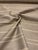 This timeless khaki and cream striped linen has a soft hand and is multipurpose. This fabric is a great quality good and...