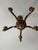 A beautifully crafted six-light carved chandelier by Paul Ferrante, finished in a warm hand-applied antiqued gilt. Rich...