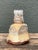With its unique form and organic glaze, this vintage abstract ceramic vase presents a striking example of mid-century...