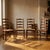 A well-crafted set of four rustic dining chairs with a classic ladder-back design and natural woven rush seats. This set...