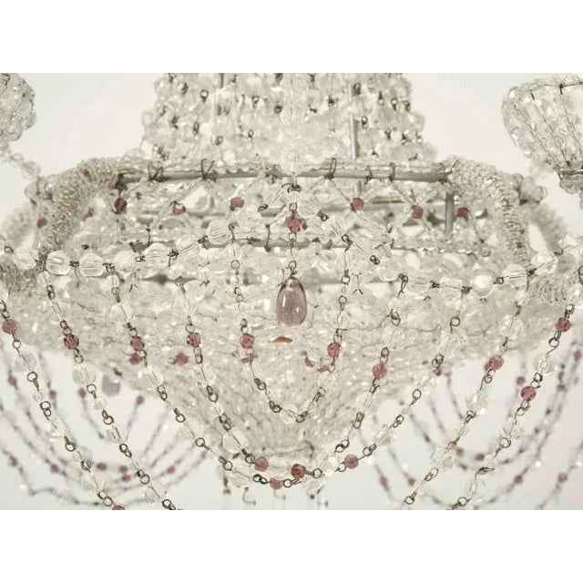 Vintage Italian chandelier with matching silver-leafed canopy. Unequivocally the most heavily beaded light I have ever...
