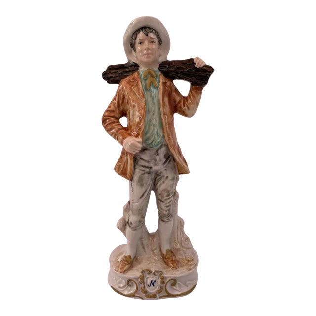 MId-Century Capodimonte Porcelain Man Carrying a Log For Sale