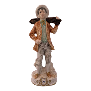 MId-Century Capodimonte Porcelain Man Carrying a Log