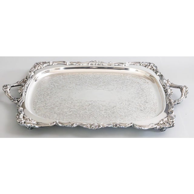 A superb Mid-20th Century silverplate rectangular footed serving tray by Gorham. Marked "Newport Gorham" on reverse. This...
