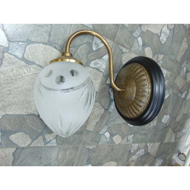 Chandelier and vintage wall lamp from the 70s, price for 2 pieces, chandelier dimensions: height 53 cm. diameter 45 cm....