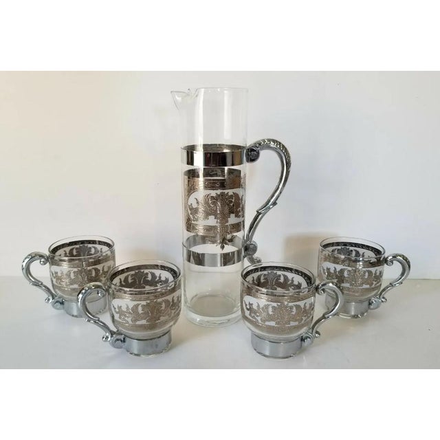 For your consideration is a Culver Hollywood Regency cocktail set. The set includes a tall cocktail pitcher with 6 footed...