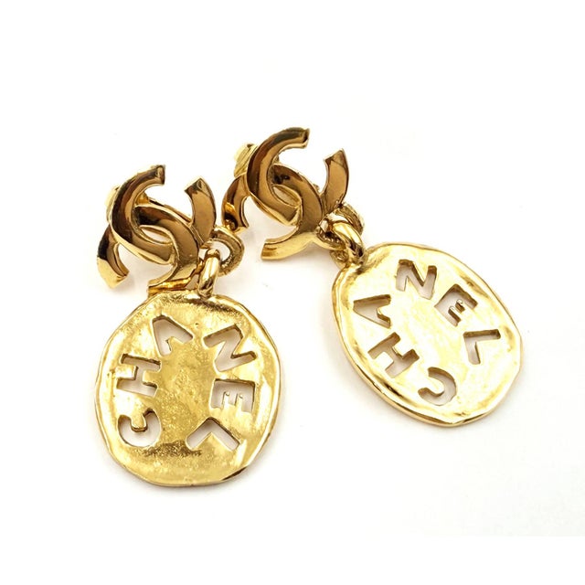 Chanel Vintage Gold Plated CC Cut out Dog Tag Clip on Earrings *Marked Chanel -It is approximately 0.9" x 2". -In a very...