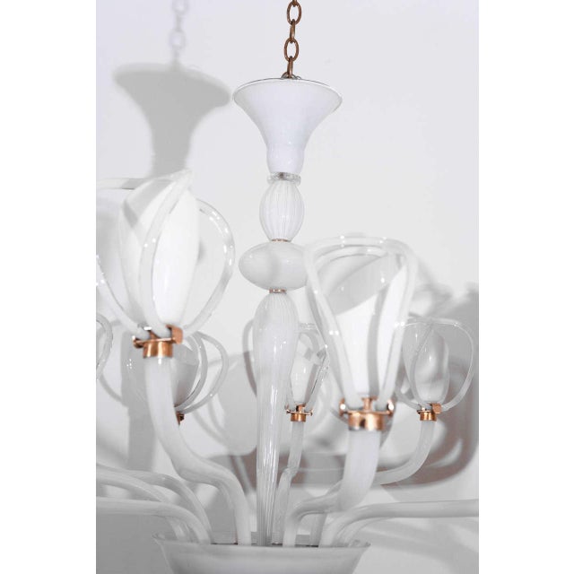 Incredible twelve-arm fixture by Venini with metal detailing. Candelabra size sockets with reducers. It's important when...