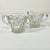 Between 1876 to 1916 American glass producers hand cut glass with sawtooth edging that became known as American Brilliant...