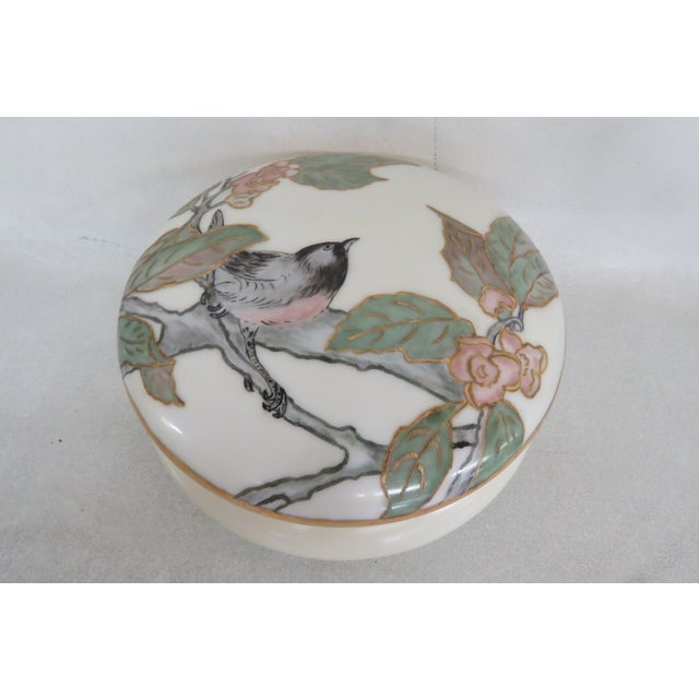 This great Box with a Cover is made out of porcelain. The box is stamped on the bottom T & V, Limoges, made in France, and...