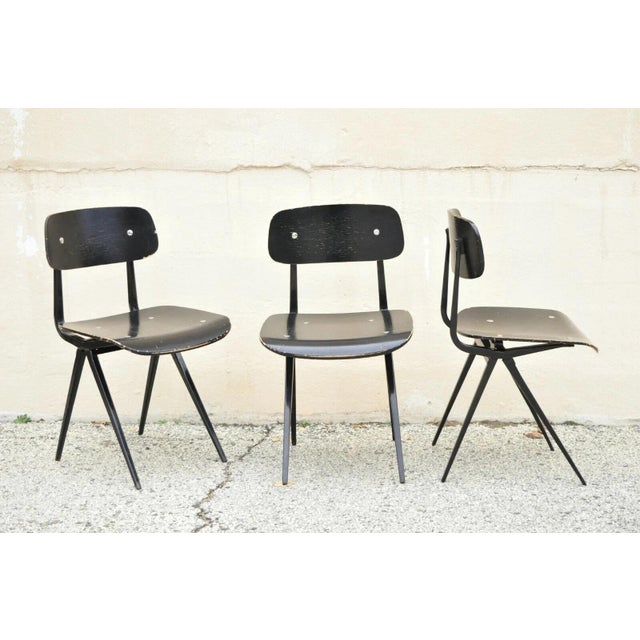 Industry West Madewell Industrial School Side Chairs with Black Metal Frame - Set of 3. Items feature a black distress...