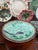 Antique majolica bowl made by Villeroy & Boch likely in their German factory. The turquoise bowl has a fan, flowers and a...