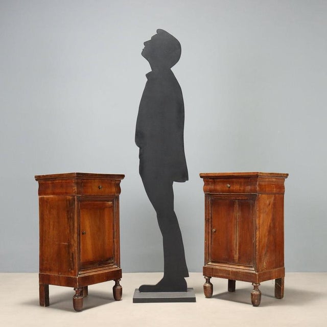 Pair of Louis Philippe style nightstands made of walnut, dating back to the second quarter of the 19th century in Italy....