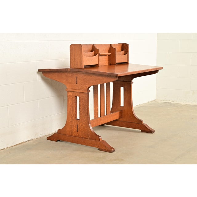 A rare and exceptional antique Mission or Arts & Crafts quarter sawn oak double desk or partner's desk By Charles P....