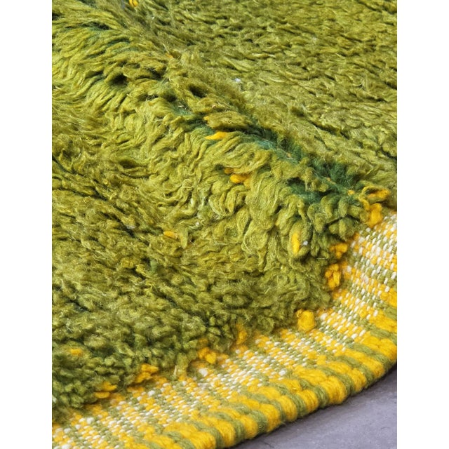 Beni Ourain Rug | Handwoven Berber Wool Rug with Green Field and Bold X Motif Product Overview This bold Beni Ourain rug...