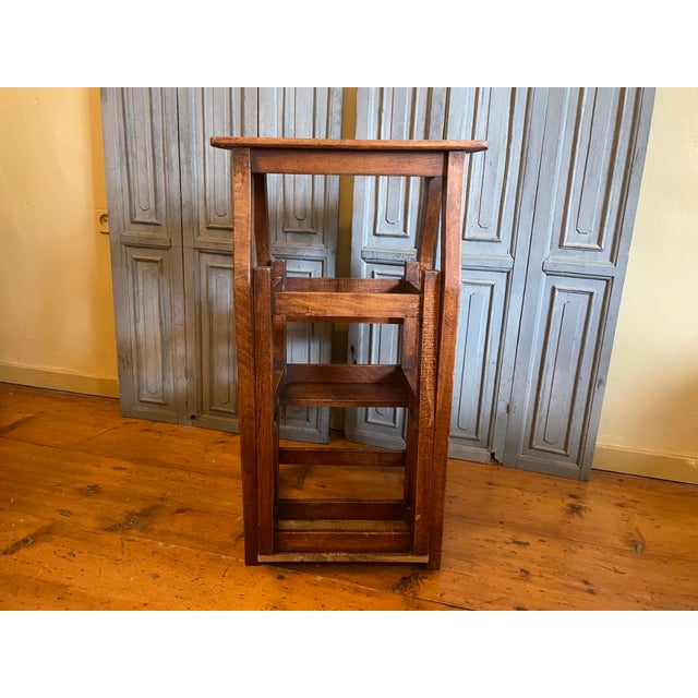 A beautiful stool that can be transformed into a step stool. Also known as a library step stool. Very handy and looks...