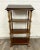 This is a beautiful wooden book stand, library stand, or lectern by Butler Specialty Company. It features three shelves...