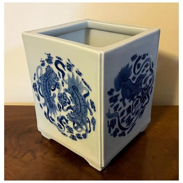 Antique 19th century Chinese blue & white porcelain brush pot. Decorated on each side with kylin tigers, mythical beasts...