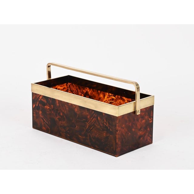 Magnificent large magazine rack in tortoiseshell-effect acrylic glass, enriched by a solid brass rim and handle. This...