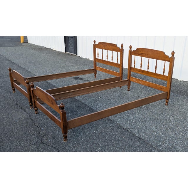 A rare and sturdy set! This matching PAIR of Twin Size Bed Frames was crafted by Baumritter (the original manufacturer for...
