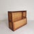 This cabinet held maps or drawings on a roll. The cabinet can be locked with the small lock in the vertical flap. Height:...