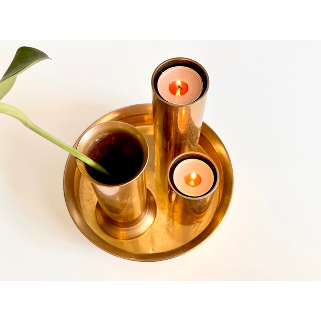A fine high-quality set in brass from the renown metal art manufactory Ekte Norsk Odel, handcrafted during the 1960s in...