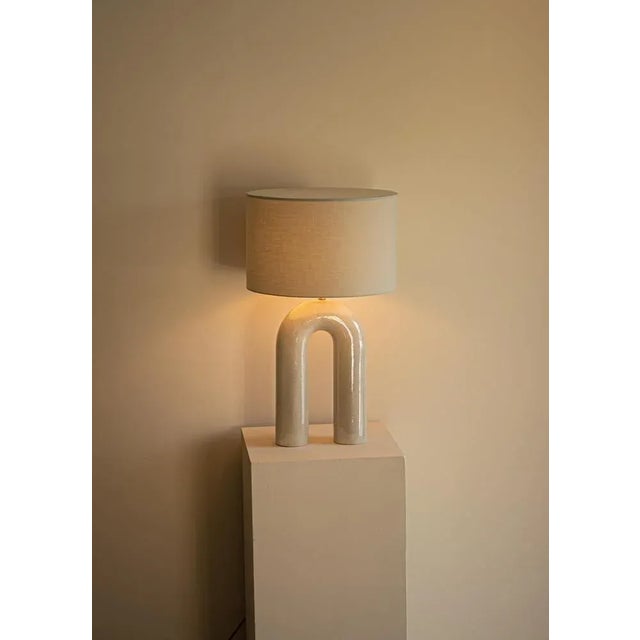 Sea ceramic arko table lamp with light brown lampshade by simone & marcel dimensions: ø 40 x h 67 cm. Materials: cotton...