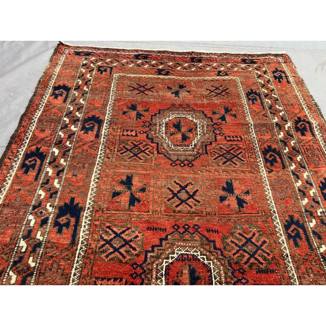 Antique Afghan Baluchi Rug With Geometric Tribal Medallion Design in Terracotta and Navy Rug For Sale - Image 4 of 11