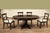 Round to Oval Dining Table in Dark Walnut Finish, With Self-Storing Leaf. An Ap Exclusive by AntiquePurveyor For Sale - Image 11 of 15