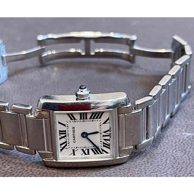 Back of watch marked CARTIER WATER REISTANT 18K 136174 CD 2403. Purchased new. Single original owner. In very good working...