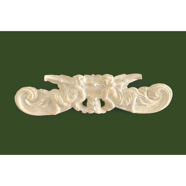 Chalkware Over Door Pediment, Putti-Cherubs, Trumpets, Gargoyle Face 21.5" Wide A great decorative piece for over a door,...