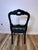 An elegant mid-19th-century Victorian balloon-back side chair, dating to approximately 1860, with a beautifully carved...