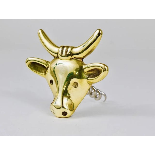 A charming Mid-Century bottle opener/cork screw, displaying a cow. A very humorous design by Walter Bosse, executed by...