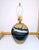 This is a vintage studio art pottery table lamp featuring a handcrafted textured clay base with a striking drip-glaze in...