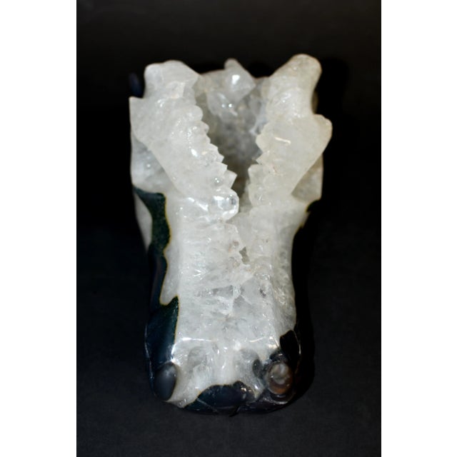 A beautiful, hand carved, all natural rock crystal dragon's head statue. Weighing at an whopping 8.5 lb, this wonderful...