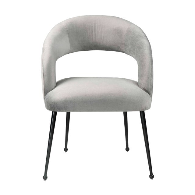 Mid Century Modern meets Hollywood Glam to form the striking Rocco dining chair. Boasting lavishly soft velvet upholstery...
