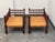 Design Plus Gallery presents a Pair of Indian Vintage Rush Seat Low Chairs. The pair has turned wood frames, rounded...