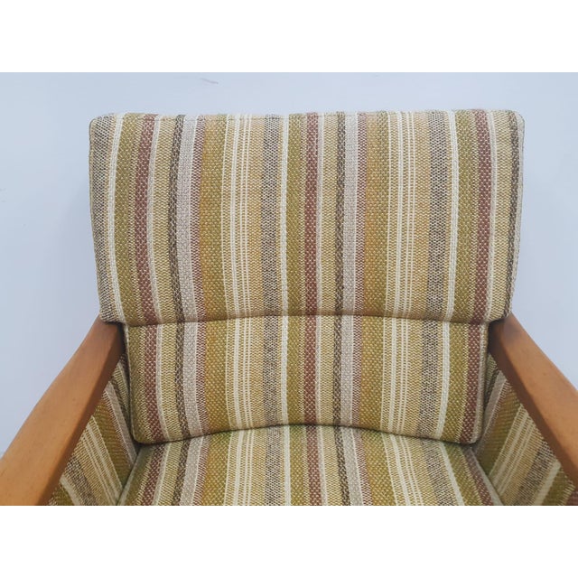 Signed, impressive Casala armchair. The armchair comes from the 1970s. Produced by the German Casala factory. Wooden...