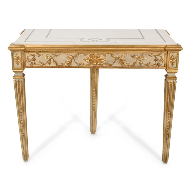 A beautifully crafted Italian painted and giltwood console table, created during the early to mid-20th century and...